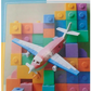 DOMS Exercise Notebook 172 Pages Unruled featuring a colorful building blocks background and a toy airplane model.