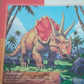 DOMS Exercise Notebook 120 Pages Medium Square cover featuring a Triceratops illustration with vibrant colors.