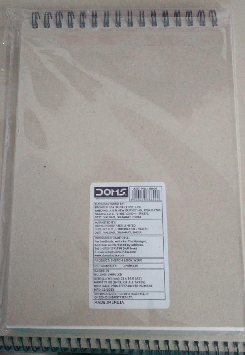 DOMS Sketch Book Wiro A5 showing plain cover and label details, ideal for sketching and drawing.