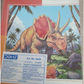 DOMS Exercise Book 120 Pages Single Line cover featuring a colorful dinosaur illustration on a notebook.